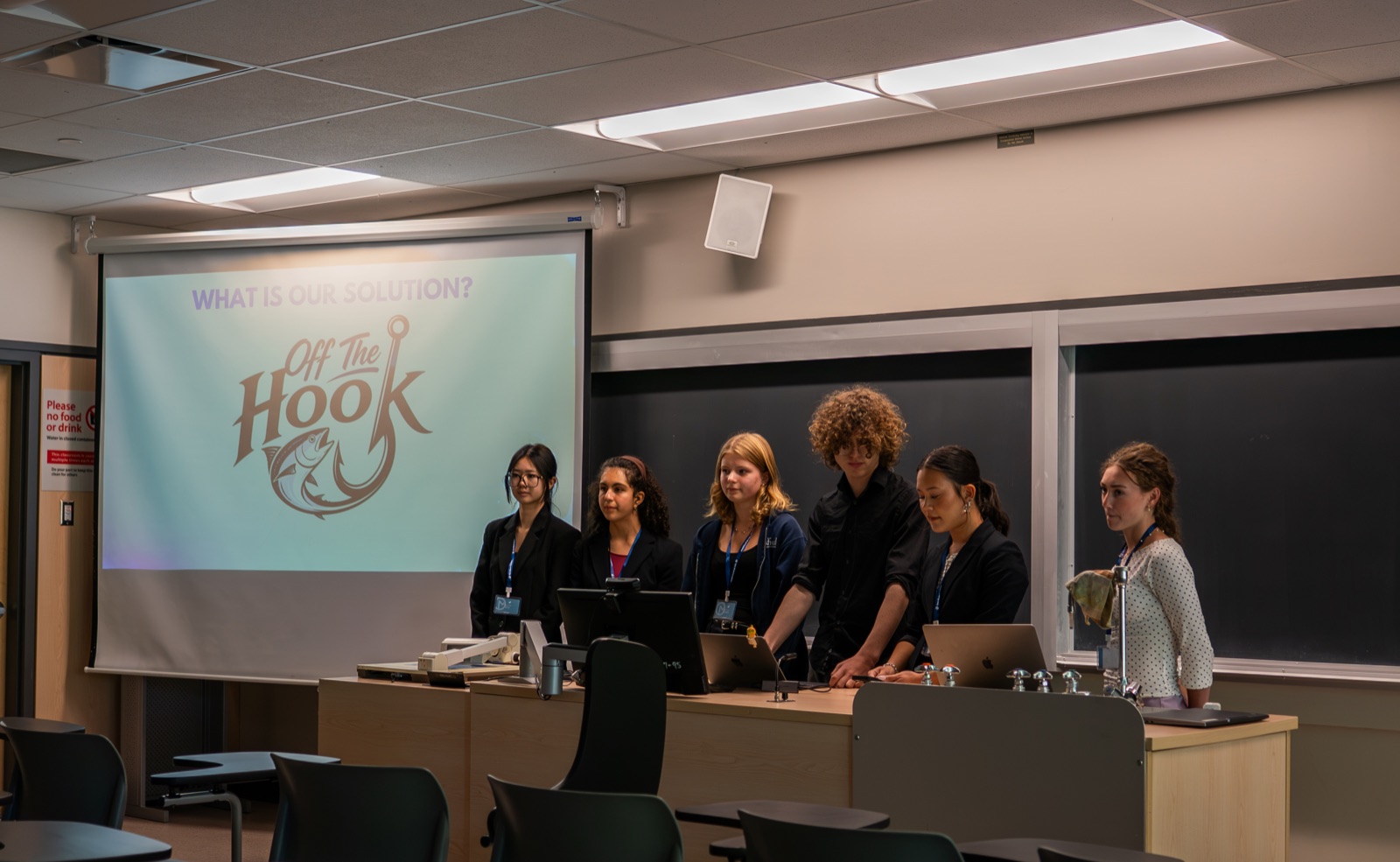A team presenting its recommendation to the judges